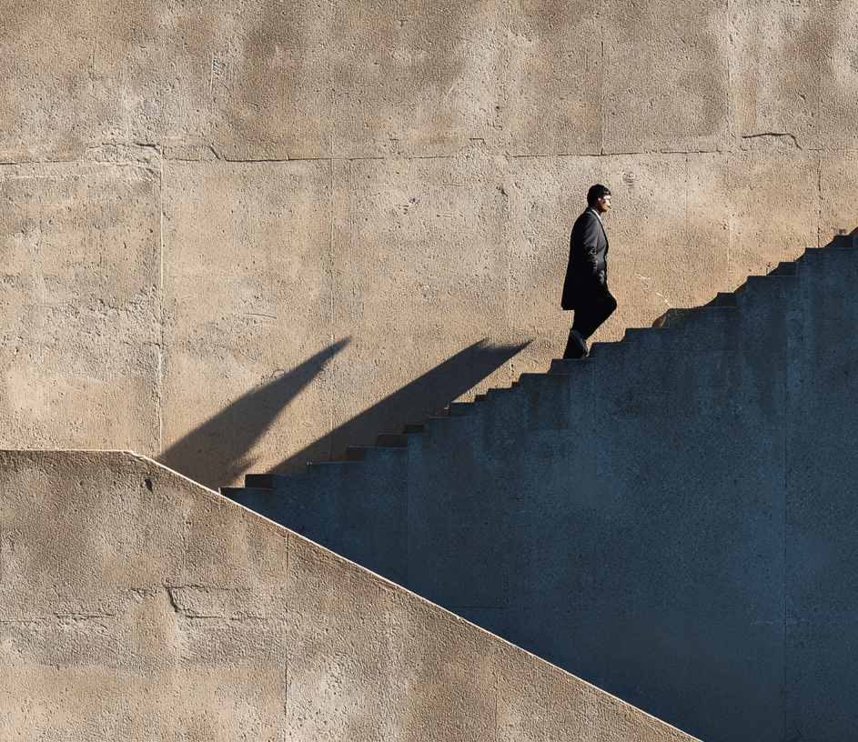 adambco_A_person_walking_up_the_stairs_captured_from_above_in_s_3c171d82-115e-4547-9b99-c49ac94f4e67-1 adambco_A_person_walking_up_the_stairs_captured_from_above_in_s_3c171d82-115e-4547-9b99-c49ac94f4e67-1